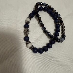 Blue and White Beaded Bracelet with Buddha Charm